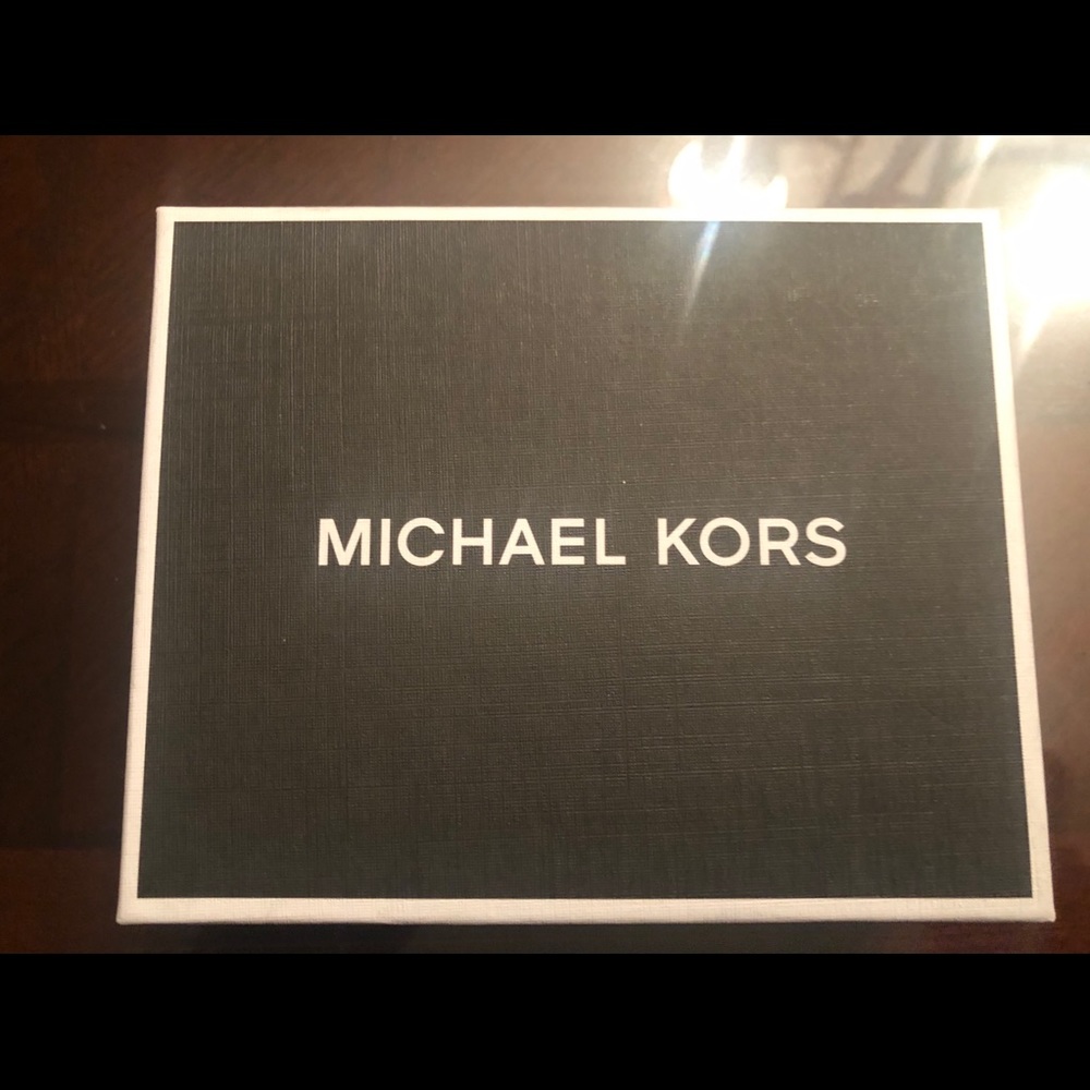 Black Micheal Kors mens wallet.